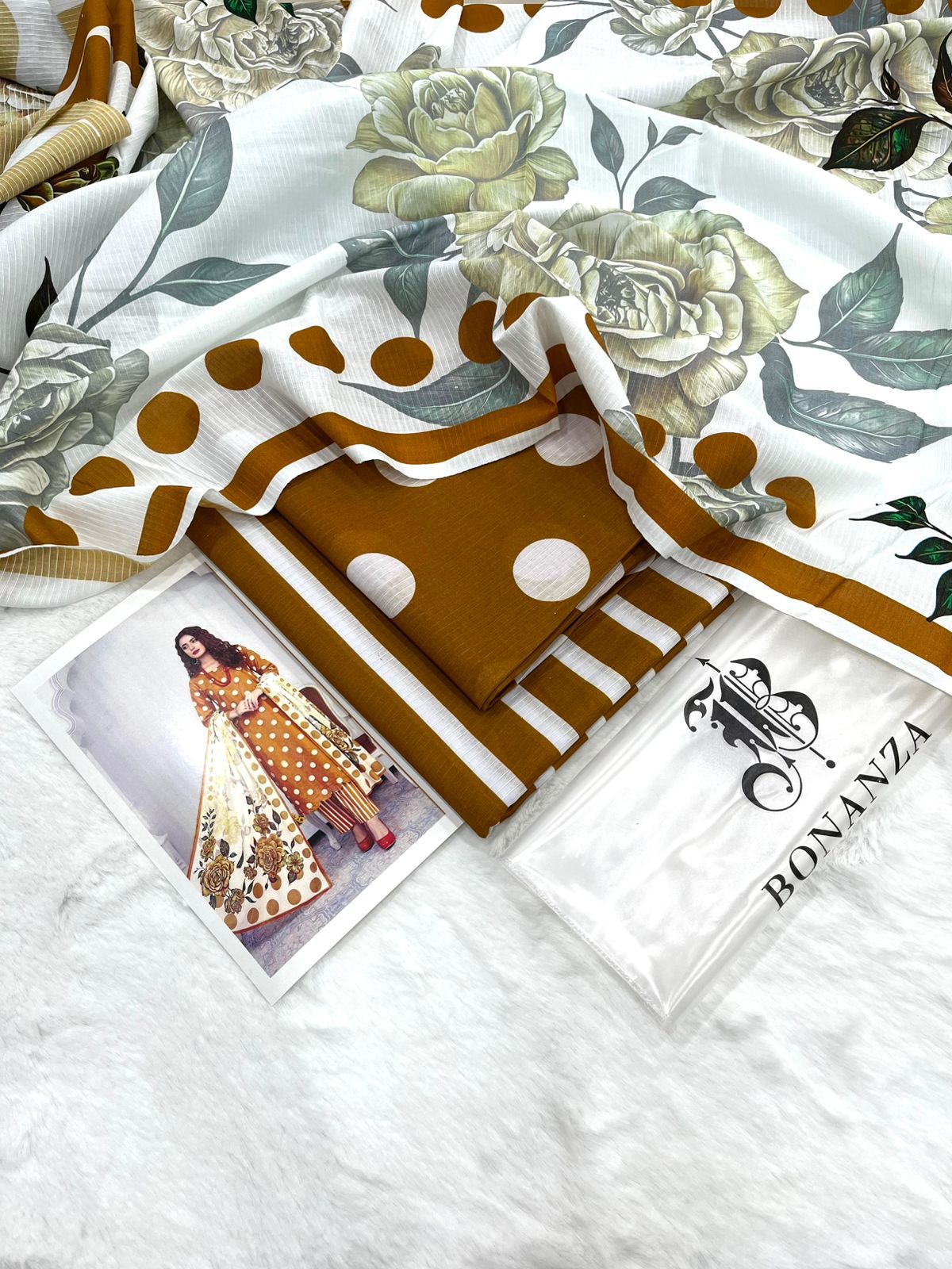 Bonanza Satrangi Unstitched 3Pc Premium Doria Lawn All Over Print Suit – Mustard Brown